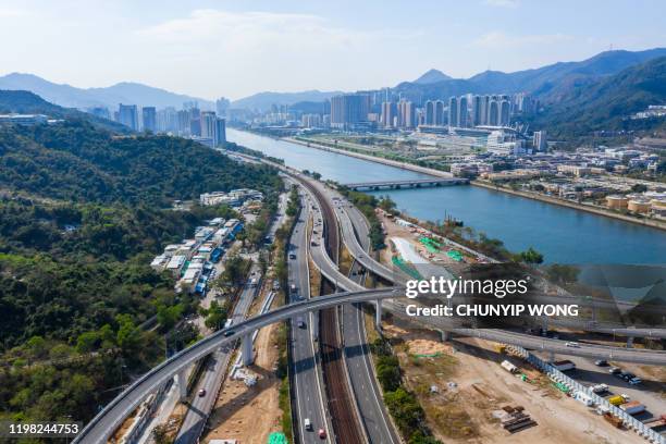 multiple lane highway in ma on shan, hong kong - shatin stock pictures, royalty-free photos & images