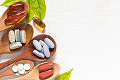 Vitamin pills and capsules