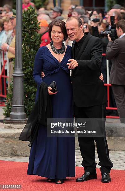 German actor Edgar Selge and his wife Franziska Walser arrive for the Bayreuth festival 2011 premiere on July 25, 2011 in Bayreuth, Germany.