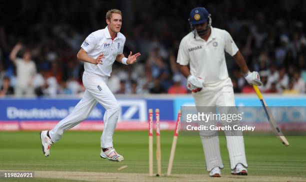 Stuart Broad of England celebrates bowling Praveen Kumar of India during day five of the 1st npower test match between England and India at Lord's...