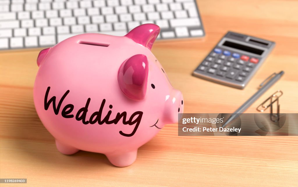 Wedding Pink Piggy Bank on desk