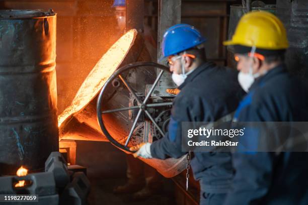 metallurgical plant, hot metal casting - foundry worker stock pictures, royalty-free photos & images