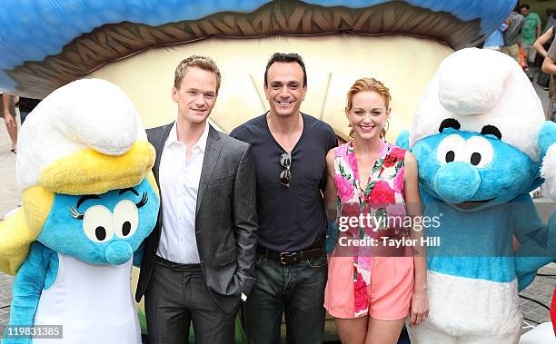 Smurfette, Neil Patrick Harris, Hank Azaria, Jayma Mays, and a smurf attend the New York Smurf Week kick off ceremony at Smurfs Village at Merchant's...