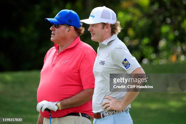 Sportscaster Chris Berman talks to Brandt Snedeker of the United States during the pro-am prior to the Sony Open in Hawaii at the Waialae Country...