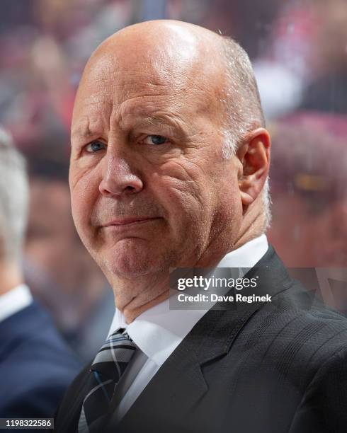 Head coach Claude Julien of the Montreal Canadiens watches the action from the bench against the Detroit Red Wings during an NHL game at Little...