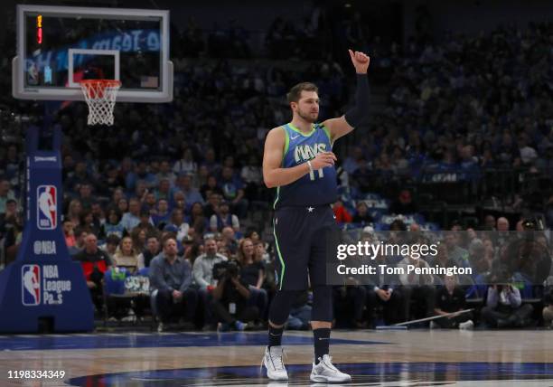 Luka Doncic of the Dallas Maverick reacts against the Denver Nuggets in the first period at American Airlines Center on January 08, 2020 in Dallas,...