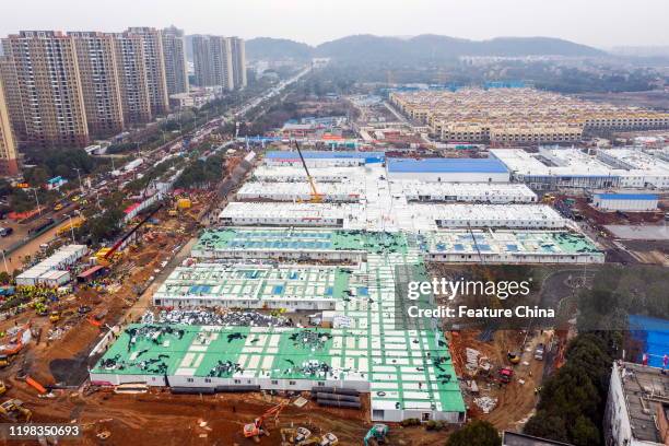 An aerial view of the construction site of Huoshenshan Hospital in Wuhan in central China's Hubei province Sunday, Feb. 02, 2020. The construction of...