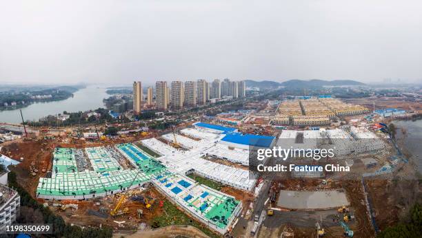 An aerial view of the construction site of Huoshenshan Hospital in Wuhan in central China's Hubei province Sunday, Feb. 02, 2020. The construction of...