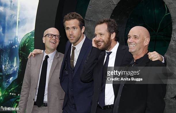 Producer Donald De Line actors Ryan Reynolds and Peter Sarsgaard and director Martin Campbell attend the 'Green Lantern' Germany Premiere at CineStar...