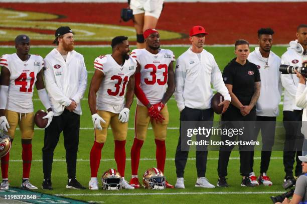 San Francisco 49ers Head Coach Kyle Shanahan and San Francisco 49ers offensive assistant coach Katie Sowers on the field prior to Super Bowl LIV on...