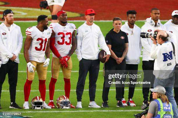 San Francisco 49ers Head Coach Kyle Shanahan and San Francisco 49ers offensive assistant coach Katie Sowers on the field prior to Super Bowl LIV on...