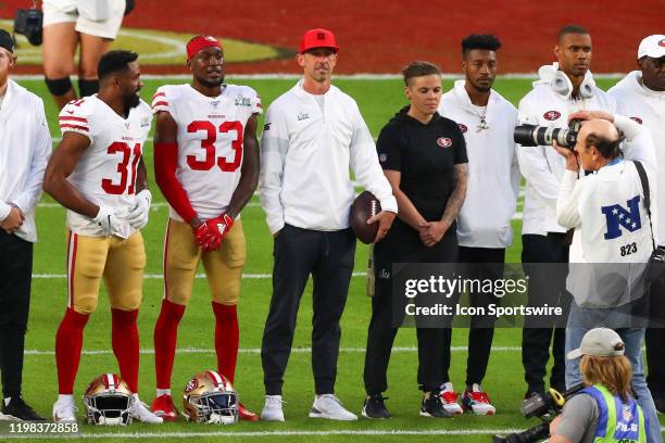 San Francisco 49ers Head Coach Kyle Shanahan and San Francisco 49ers offensive assistant coach Katie Sowers on the field prior to Super Bowl LIV on...