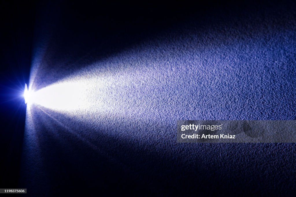 Unfocused textured background surface shadow frame work illuminated by electric lantern ray of light mock up pattern empty copy space for your text here