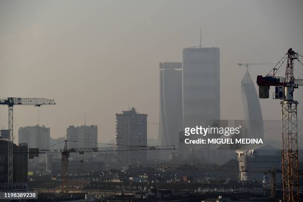 This picture taken on February 3 shows the air pollution at the City Life district of Milan.