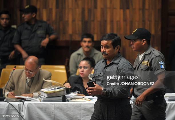 Reyes Collin, one of four military men accused of an extra-judicial execution of 252 farmers in 1982, gets ready to testify during the trial in...