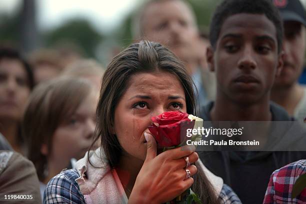 Elizabeth Amundsen cries as hundreds of thousands of people gather at a memorial vigil following Friday's twin extremist attacks, July 25, 2011 in...