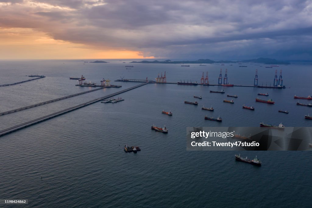 Aerial view of fuel and gas chemical tanker ship in port, Refinery Industry and export cargo ship