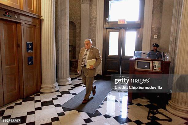 Sen. Mike Enzi leaves a Republican caucus meeting in the U.S. Capitol July 25, 2011 in Washington, DC. Senate Democrats and Republicans were...