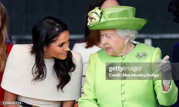 Meghan, Duchess of Sussex and Queen Elizabeth II attend a ceremony to open the new Mersey Gateway Bridge on June 14, 2018 in Widnes, England. Meghan...