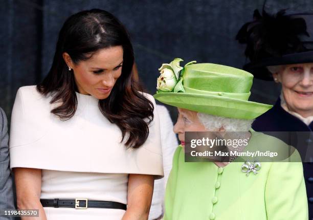 Meghan, Duchess of Sussex and Queen Elizabeth II attend a ceremony to open the new Mersey Gateway Bridge on June 14, 2018 in Widnes, England. Meghan...