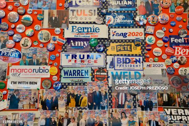 Campaign slogans, buttons, stickers and memorabilia, of US Presidential Candidates past and present, some autographed, decorate the walls and floors...