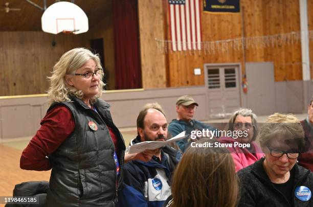 Pat Clark speaks on behalf of Democratic presidential candidate Sen. Bernie Sanders on February 3, 2020 in Carpenter, Iowa. Iowa is the first contest...