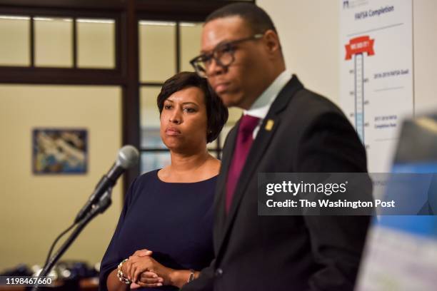 Public Schools Chancellor Lewis D. Ferebee, front, and Mayor Muriel Bowser discuss the roll out the chancellor's first big initiative, at Eastern...
