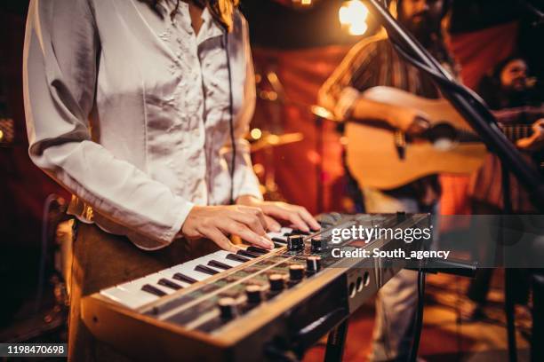 music band  on stage - synthesizer stock pictures, royalty-free photos & images