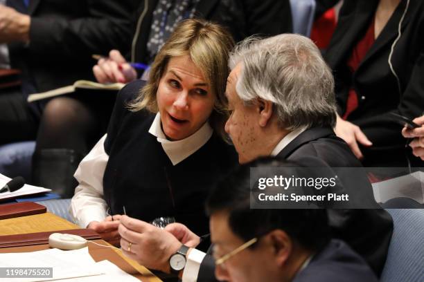United Nations Secretary-General António Guterres speaks with the United States Permanent Representative to the UN Kelly Craft during a UN Security...