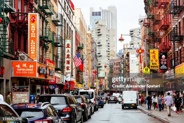 chinatown neighbourhood in new york city, usa - chinatown stock-fotos und bilder