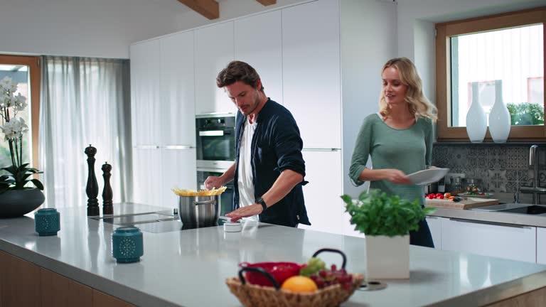 Two Cook Kithcne Couple Cooking Together Modern Kitchen Videos and HD Footage - Getty Images