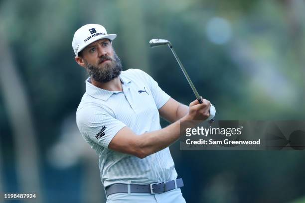Graham DeLaet of Canada plays a shot on the fourth hole during the first round of the Sony Open in Hawaii at the Waialae Country Club on January 09,...