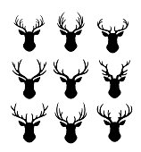 Reindeers with antlers silhouette flat vector illustrations set. Deers head with horns isolated on white background collection. Christmas season festive animal symbol design elements pack.