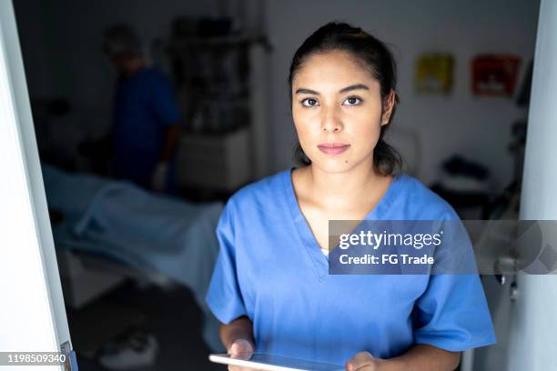 Nurse Using Camera 1,086 Operating Room Nurse Looking At Camera Stock Photos, High-Res ...