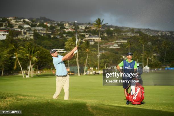 Brendan Steele of the United States plays a shot from a bunker on the 17th hole during the first round of the Sony Open in Hawaii at the Waialae...