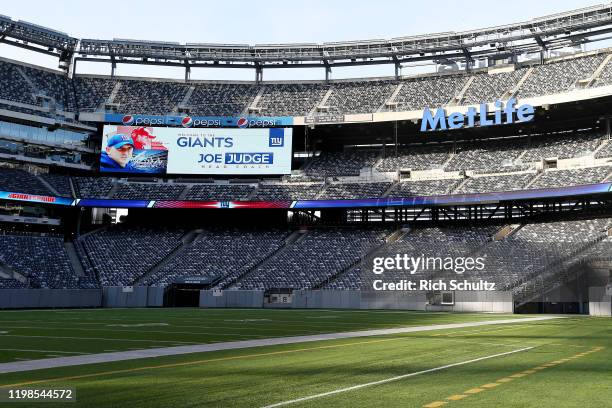 Video display board welcomes Joe Judge as the new head coach of the New York Giants during a news conference at MetLife Stadium on January 9, 2020 in...