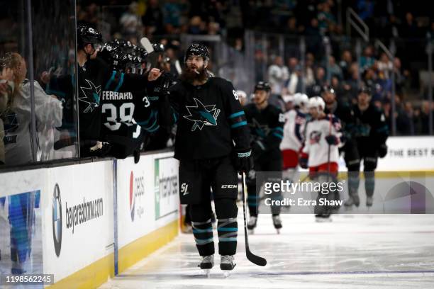 Brent Burns of the San Jose Sharks is congratulated by teammates after he scored against the Columbus Blue Jackets at SAP Center on January 09, 2020...