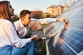 Young family getting to know alternative energy