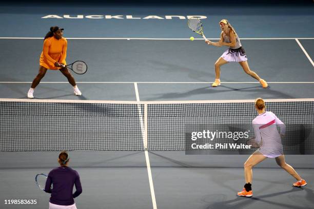 Serena Williams of the USA and Caroline Wozniacki of Denmark in action during their doubles semifinal against Kirsten Flipkens and Alison van...