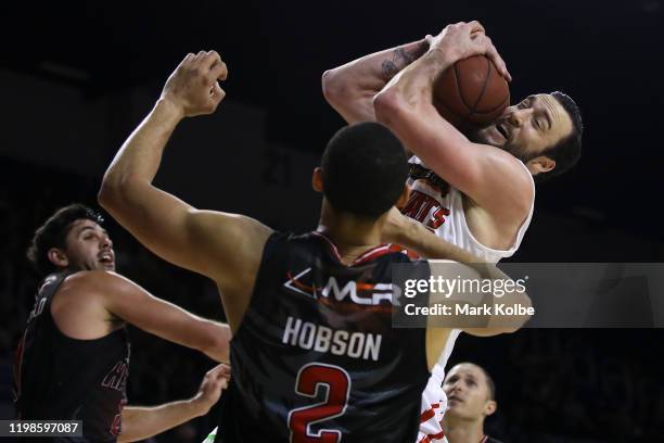 Miles Plumlee of the Wildcats wins the ball during the round 15 NBL match between the Illawarra Hawks and the Perth Wildcats at the WIN Entertainment...