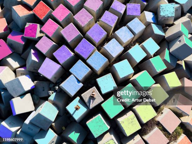 creative picture made with drone of ballerina in colorful breakwater with nice pattern. - ângulo diferente imagens e fotografias de stock