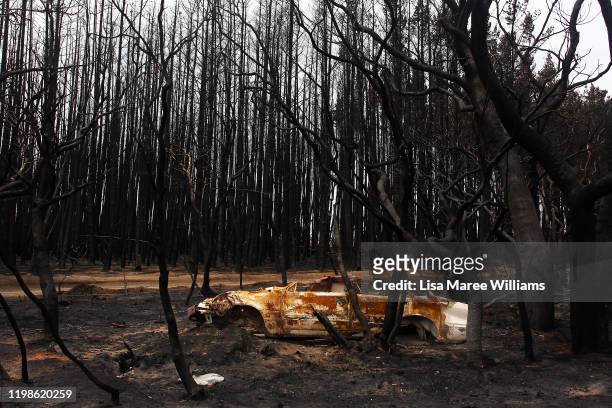 Bushfire damaged car is seen at the edge of the Playford Highway west of Parndana on January 10, 2020 on Kangaroo Island, Australia. Over 100,000...