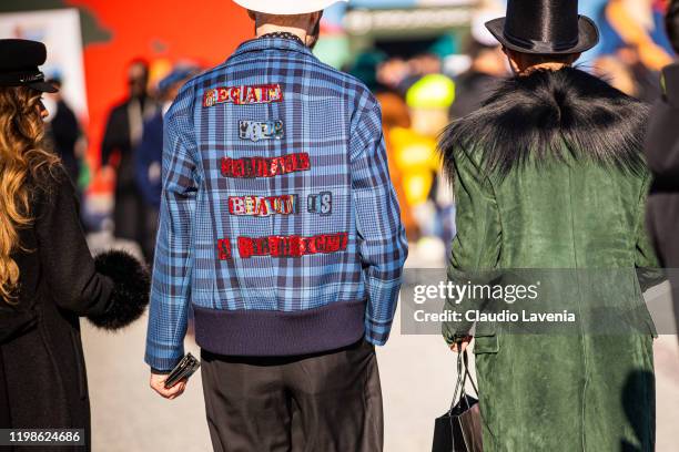 Raimondo Rossi and a guest jacket details, are seen at Fortezza Da Basso on January 09, 2020 in Florence, Italy.