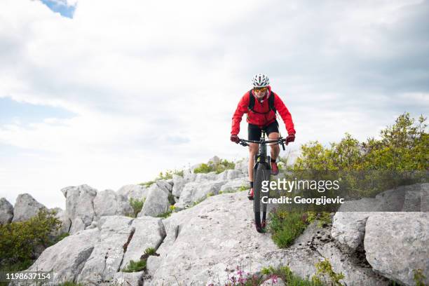 ciclismo in montagna - georgijevic mountain biker foto e immagini stock