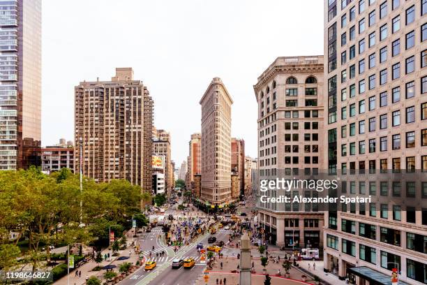 new york skyline with broadway, fifth avenue and flatiron building - broadway manhattan stock pictures, royalty-free photos & images
