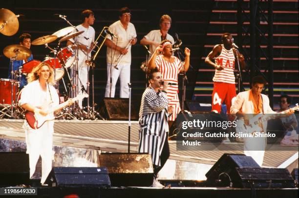 Culture Club on stage at Yokohama Stadium, Yokohama, Japan, 10th August 1985. L-R Jon Moss , Roy Hay , Boy George , Mikey Craig .