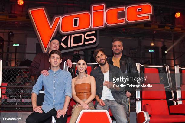 Lukas Nimscheck, Florian Sump of the band Deine Freunde, Lena Meyer-Landrut, Max Giesinger and Sasha attend the "The Voice Kids" judges photocall at...