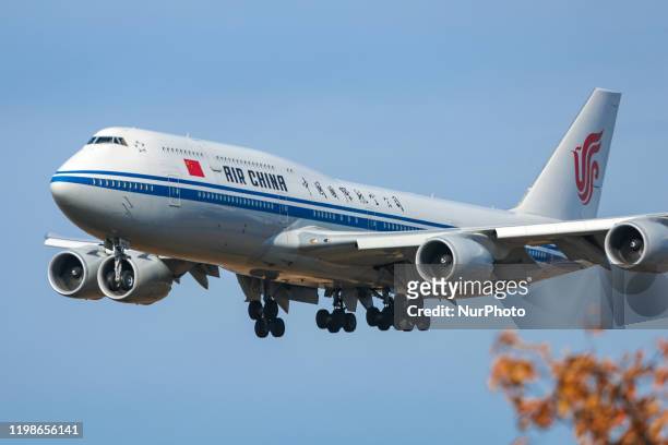 Air China Boeing 747-8 commercial aircraft, nicknamed the Queen of the Skies, as seen flying on final approach landing at New York JFK John F....