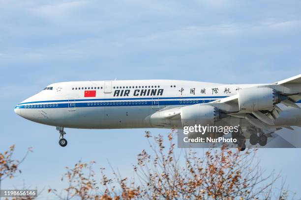 Air China Boeing 747-8 commercial aircraft, nicknamed the Queen of the Skies, as seen flying on final approach landing at New York JFK John F....