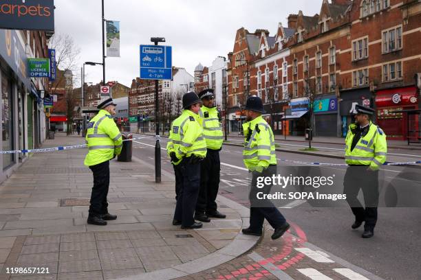 Police officers on Streatham High Road where 20 year old, Sudesh Amman was shot by police after he stabbed people on Sunday 2 February. Sudesh Amman...